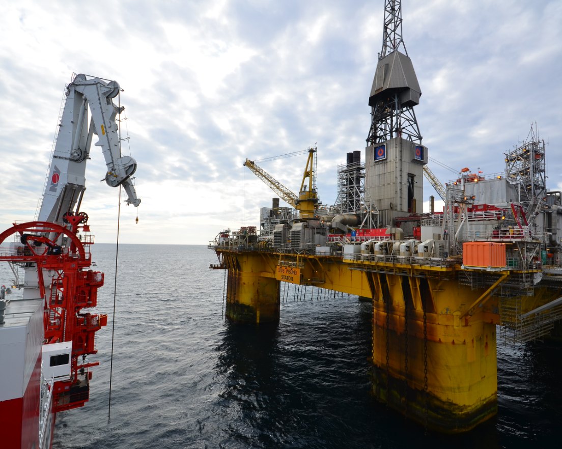 An offshore platform seen from the deck of a construction vessel